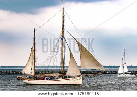 Rostock, Germany - August 2016: Sailing ship Carmelan on the baltic sea. Hanse-Sail Warnemuende at port Rostock, Mecklenburg-Vorpommern, Germany. Tall Ship.Yachting and Sailing travel. Cruises and holidays