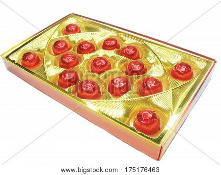 sweetmeats in red casing in gold box