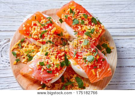 Filled eggs with salmon pinchos tapas from Spain recipes pintxos
