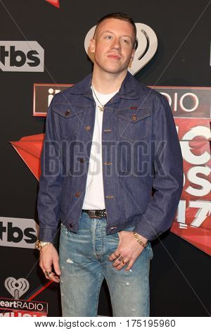 LOS ANGELES - MAR 5:  Macklemore, aka Ben Haggerty at the 2017 iHeart Music Awards at Forum on March 5, 2017 in Los Angeles, CA