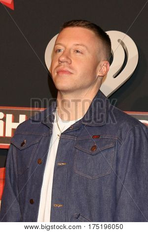 LOS ANGELES - MAR 5:  Macklemore, aka Ben Haggerty at the 2017 iHeart Music Awards at Forum on March 5, 2017 in Los Angeles, CA