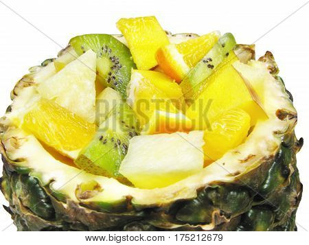 fruit salad in pineapple peel closeup tropical dessert