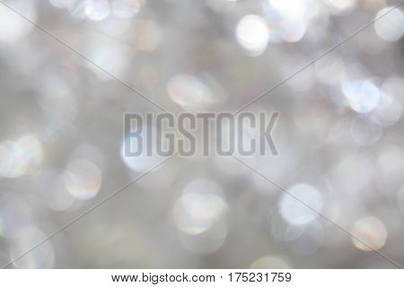 Bokeh silver white light universal shiny sparkle background