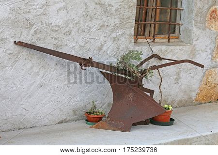 Rusty Old Plow With Big Knife Left On The Farm