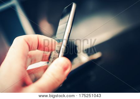 Daily Mobile Device Using. Mobiles Applications and Internet on the Go Photo Concept.