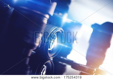 Photography and Photo Studio Equipment on the Glassy Rack. Professional Imaging and Optical Equipment.