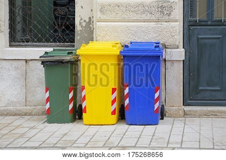 Sorting and Recycling Plastic Wheelie Bins Trash Cans