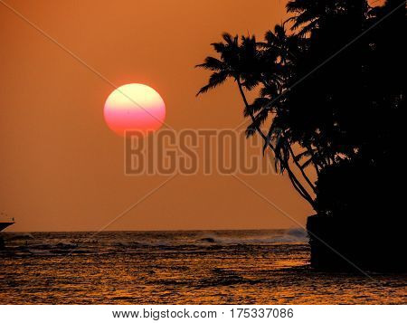 Sun setting at Diamondhead Beach Park, oahu