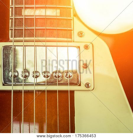 Rock guitar. Close-up view part of guitar, very popular musical instrument of the world.