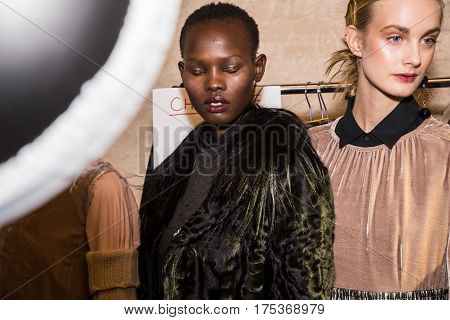 MILAN ITALY - FEBRUARY 25: Gorgeous models pose in the backstage just before Cividini show during Milan Women's Fashion Week on FEBRUARY 25 2017 in Milan.