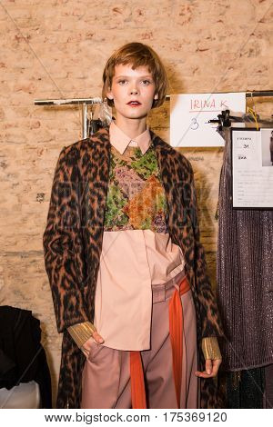 MILAN ITALY - FEBRUARY 25: Gorgeous model poses in the backstage just before Cividini show during Milan Women's Fashion Week on FEBRUARY 25 2017 in Milan.