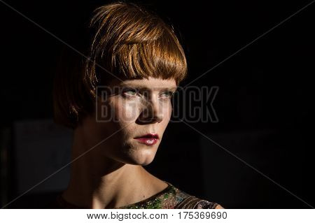 MILAN ITALY - FEBRUARY 25: Gorgeous model poses in the backstage just before Cividini show during Milan Women's Fashion Week on FEBRUARY 25 2017 in Milan.