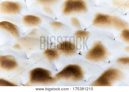 Texture of jewish passover matzah unleavened bread . Symbol of jewish passover.