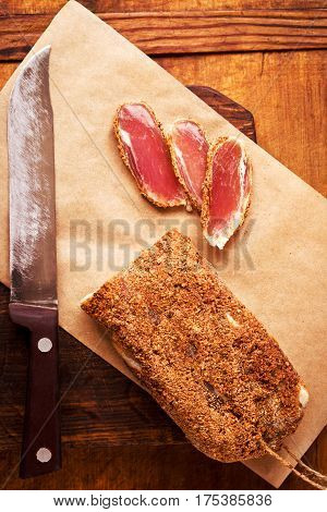 Pastirma on brown paper, ready to eat, directly above