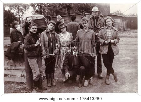 VITEBSK BELARUS - SEPTEMBER 1988: Students of Vitebsk medical institute on seasonal agricultural work in collective farm group photograph (vintage black and white photo 1988)