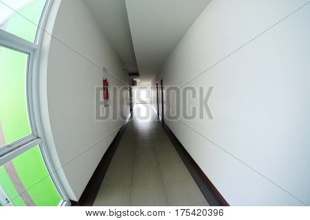 Corridor in hotel building with apartment rooms