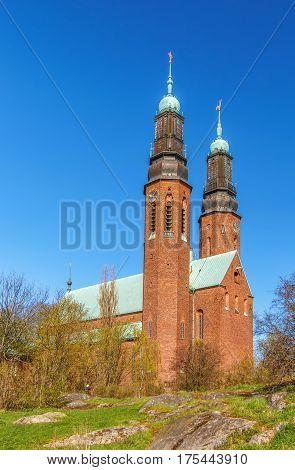 Hogalid Church is the red brick church built in 1923 year in Romantic style Stockholm Sweden