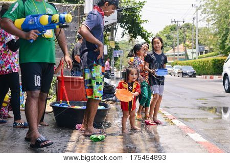 Children the Water Battle in Songkran Festival, celebration of Traditional Thailand New Year. Thailand, Samui, beach chaweng, April 13, 2016