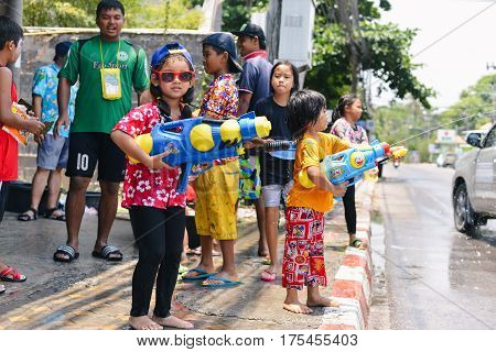 Children the Water Battle in Songkran Festival, celebration of Traditional Thailand New Year. Thailand, Samui, beach chaweng, April 13, 2016