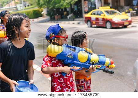 Children the Water Battle in Songkran Festival, celebration of Traditional Thailand New Year. Thailand, Samui, beach chaweng, April 13, 2016
