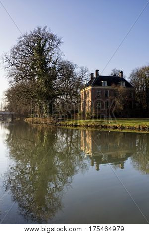 Rhijnauwen castle on the banks of the river Kromme Rijn near Bunnik