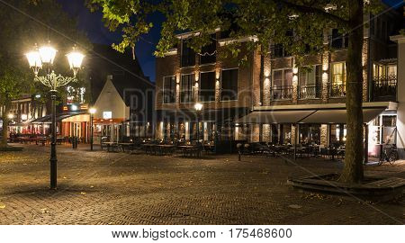Bunschoten The Netherlands - October 19 2016: Evening on Spuiplein in the village of Bunschoten Spakenburg in the province of Utrecht The Netherlands.