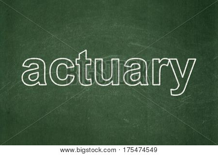 Insurance concept: text Actuary on Green chalkboard background