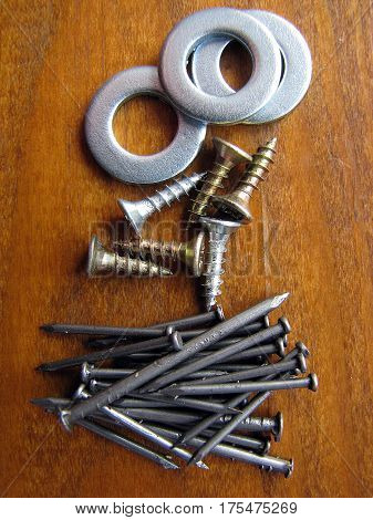 Hardware shop. Iron washers texture background. Washers, nails, self-tapping screws