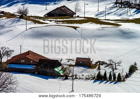 Natural Landscape With Lonely House In The Snow. Alps.