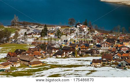 Aerial View Of A Little Village In Alps