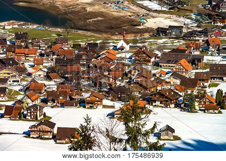 Aerial View Of A Little Village In Alps