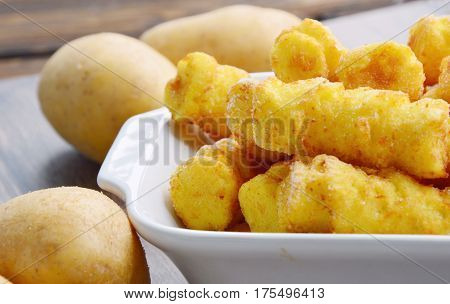 Frozen Cylindrical potato croquettes or German name is Kroketten