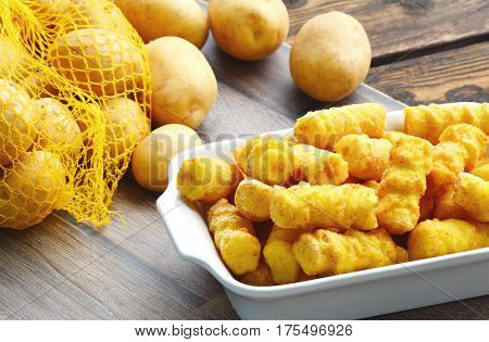 Frozen Cylindrical potato croquettes or German name is Kroketten
