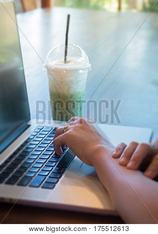 Woman Hands Typing On Laptop stock photo