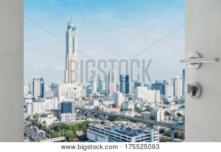Opened White Door To Bangkok City Skyline With Modern Buidings As Background