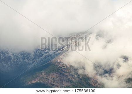 Atmospheric Clouds Of Fog Cover The Top Of The Mountain. Crimea. Yalta. Ay Petrinskaya Yaila.