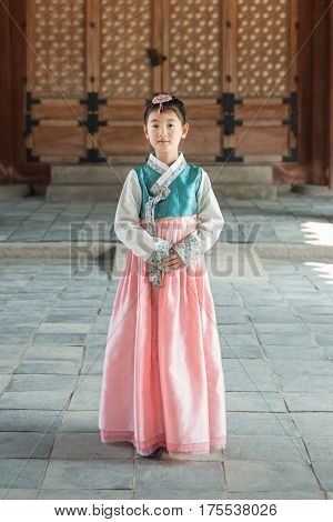 Beautiful Korean Girl In Hanbok At Gyeongbokgung, The Traditional Korean Dress.