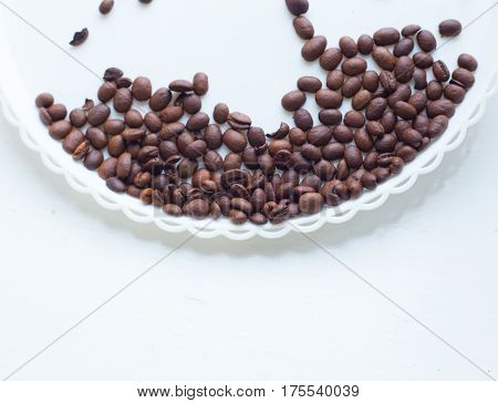 Coffee Beans On A White Plastic Plate. Beautifull Background. Love. Insparation. On White Plate.