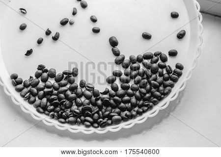 Coffee Beans On A White Plastic Plate. Beautifull Background. Love. Insparation. On White Plate.