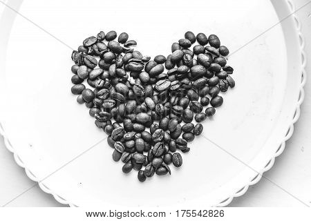 Coffee Beans In Form Of Heart On Beautifull Background. Love. Insparation. On White Plate.