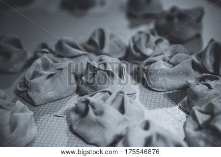 Preparation Of Manti On A Kitchen Wooden Board. Traditional Asian Dumplings