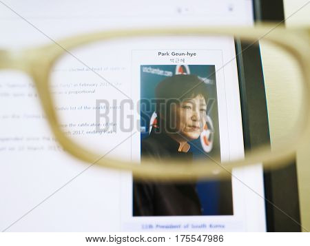 SEOUL SOUTH KOREA - March 10 2017: Photo of Wikipedia web page about Park Geun-hye on a monitor screen through glasses.