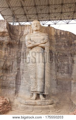 Statue of standing Buddha at Gal Vihara in Polonnaruwa or Pulattipura ancient city Kingdom of Polonnaruwa in Sri Lanka