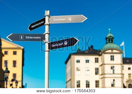 Gamla stan sign in foreground and old town architecture in background. Stockholm Sweden Scandinavia Europe.
