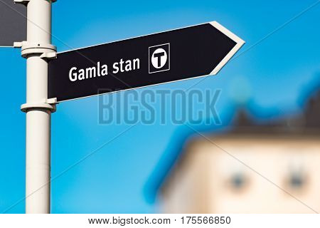 Gamla stan sign in foreground and old town architecture in background. Stockholm Sweden Scandinavia Europe.
