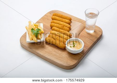 Seafood - Fish Sticks On A Wooden Board