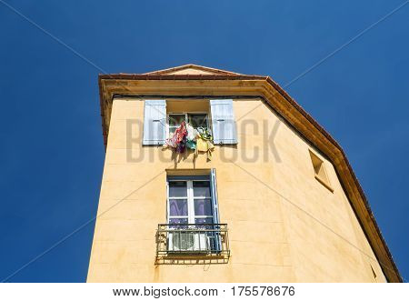 House with open windows. Europe. France. Perpignan