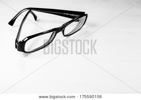 Black frame glasses isolated on white background