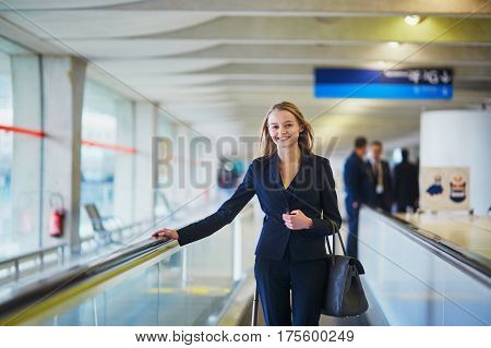 Woman On Travelator In The International Airport