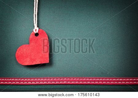 Valentines Day card with heart on  fabricbackground